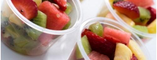 Picture of plastic cups filled with fruit salad